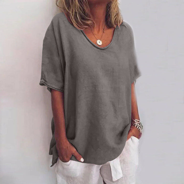 QUINA EN VEELZIJDIGE LINNEN BLOUSE