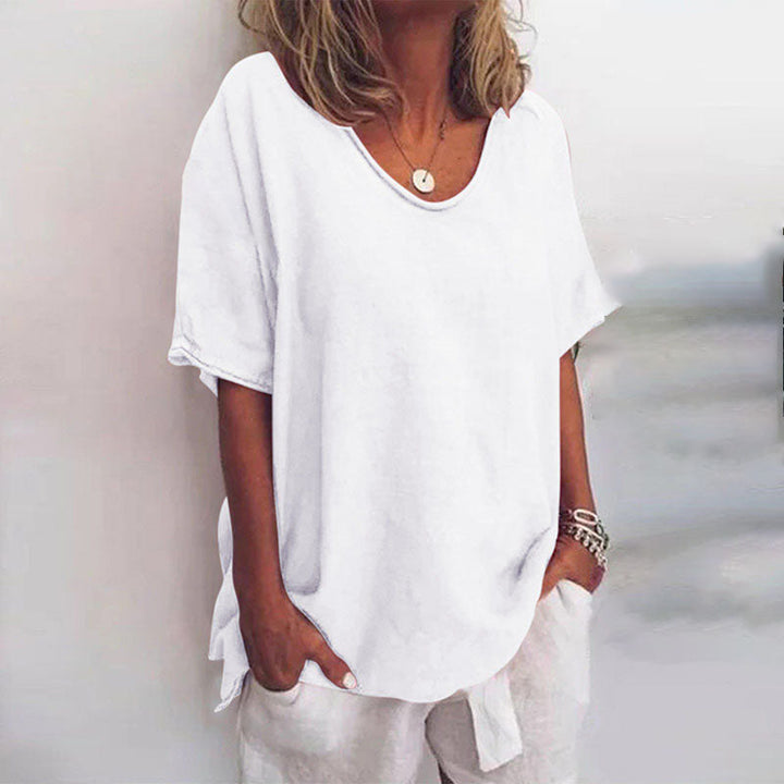 QUINA EN VEELZIJDIGE LINNEN BLOUSE